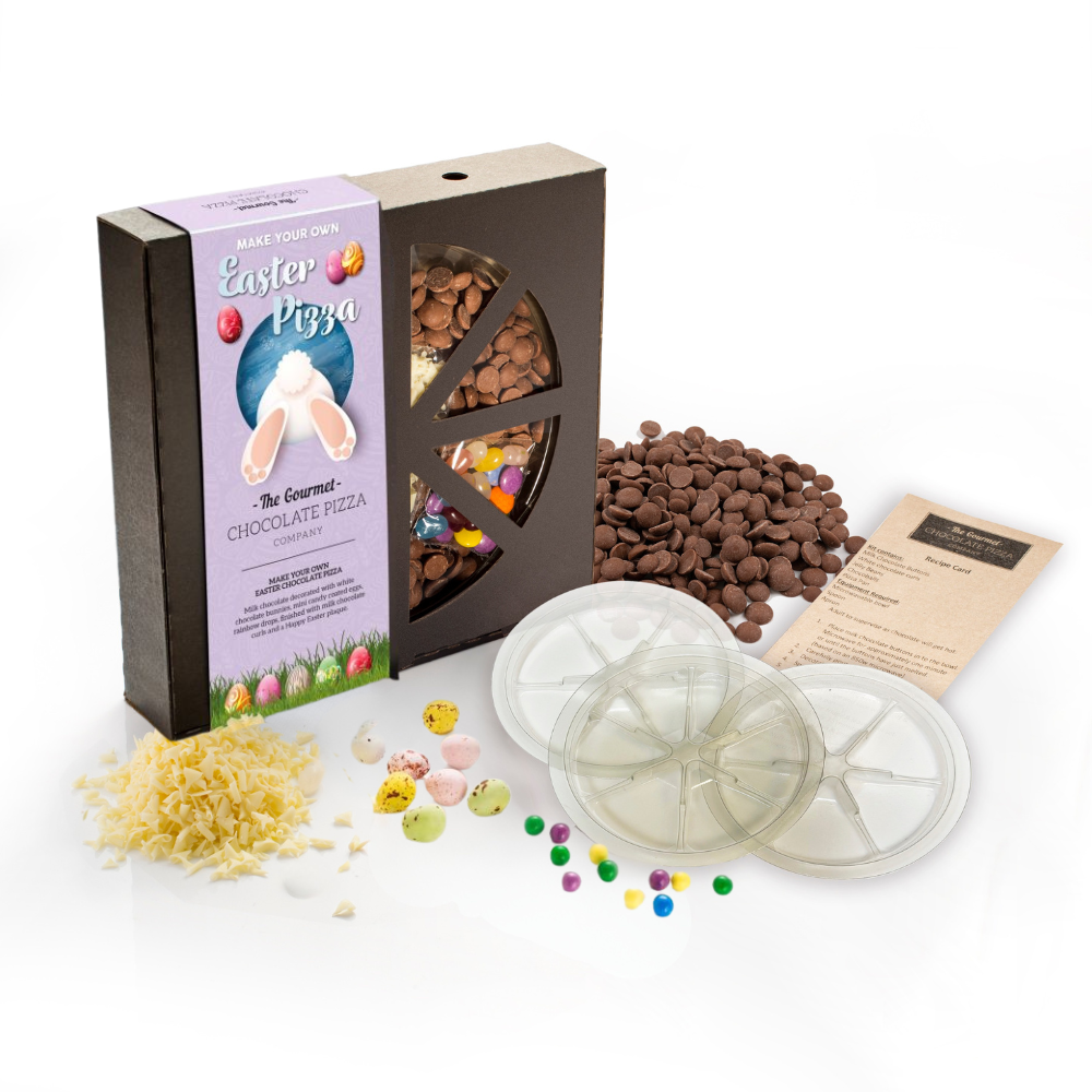 DIY chocolate pizza kit with mini pizza moulds, rainbow drops, mini eggs, milk chocolate buttons and white chocolate curls.
